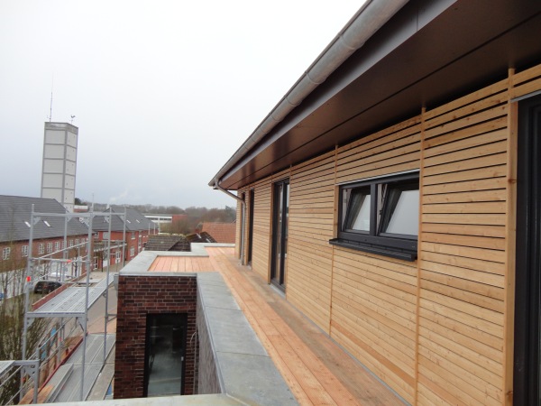 Bild von Hasselbrink Zimmerei - Titel: Penthouse mit Zink-Stehpfalz arbeiten