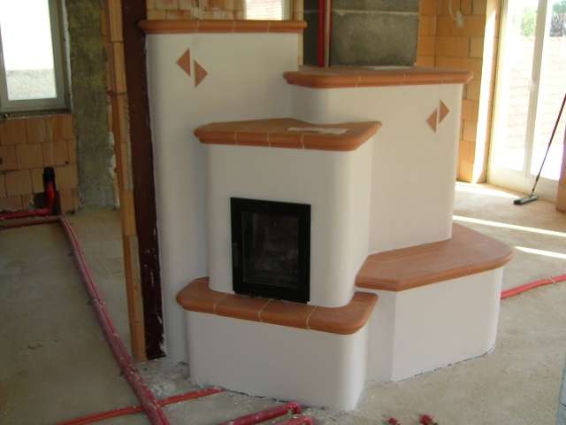 BAU.DE / BAU-Forum: 3. Bild zu Antwort "Grundofen im Reiheneckhaus: Optimale Wahl bei offener Bauweise" auf die Frage "Grundofen Strahlungsw&auml;rme: Optimale W&auml;rmeverteilung im Reiheneckhaus?" im BAU-Forum "Kamin und Kachelofen"